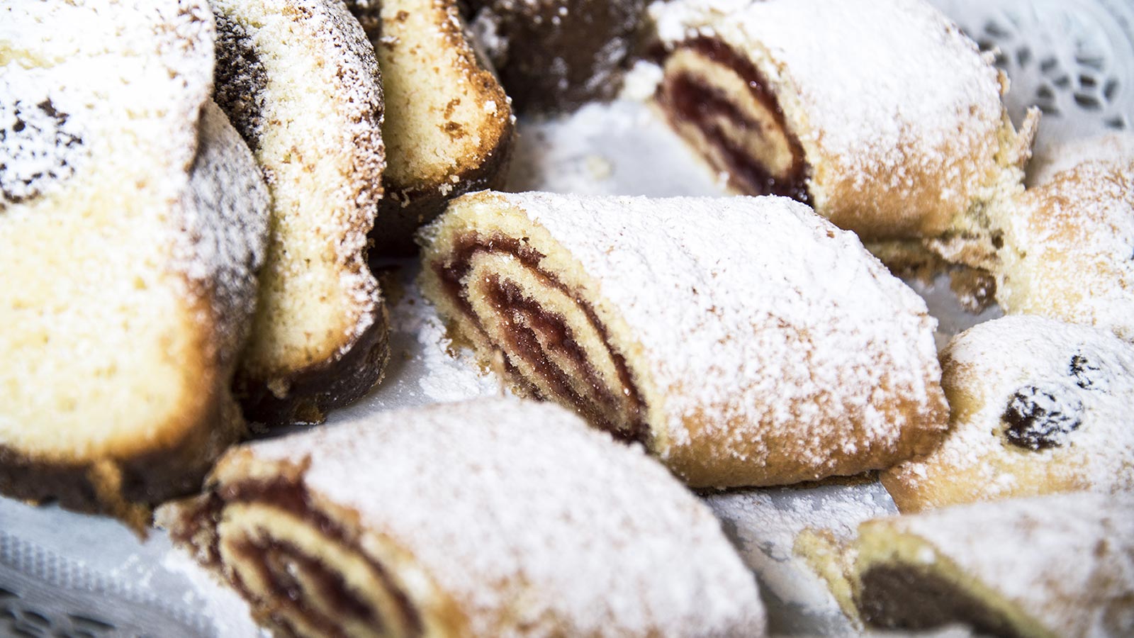 Typical South Tyrolean sweet with jam sprinkled with icing sugar