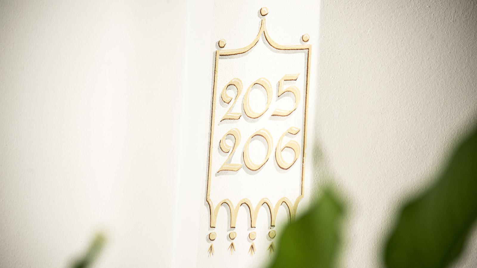 Detail of hotel Gschwendt's room numbers with golden lettering
